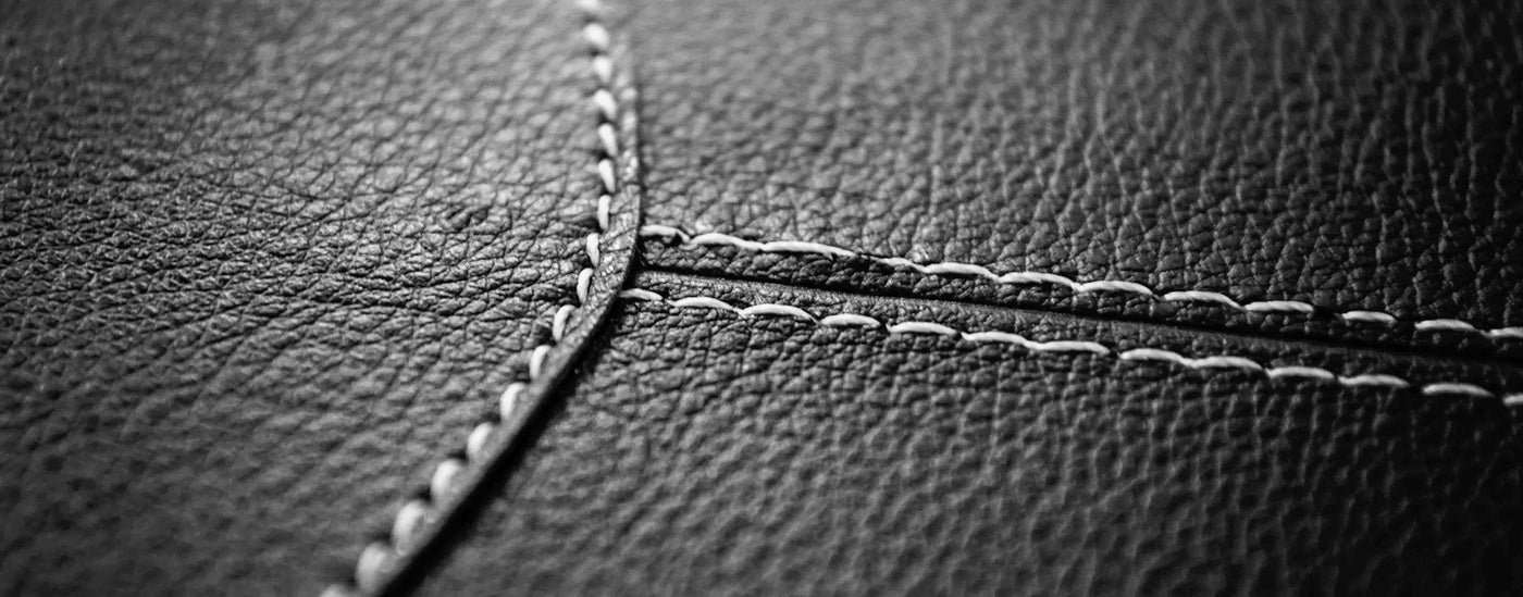 Close up of black faux leather.