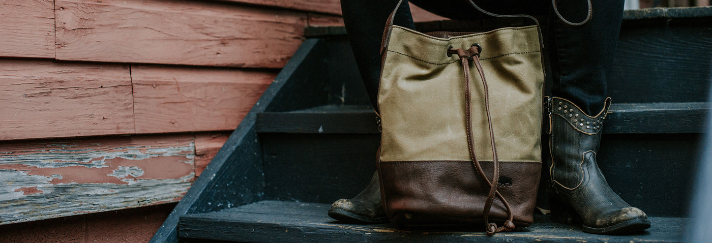 Women's Leather Bucket Bag on stairs