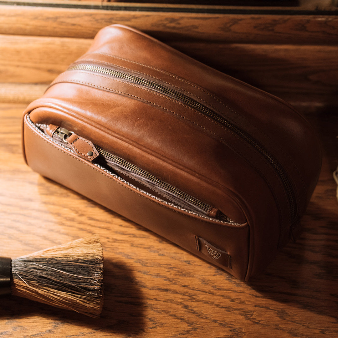 Vintage Leather Leather Dopp Kit on rustic dresser