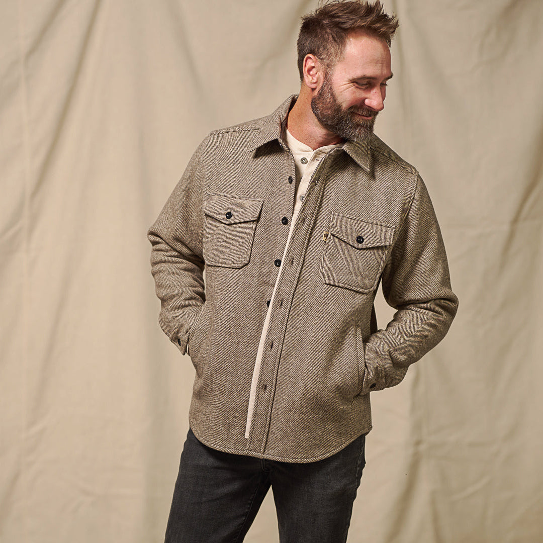 Styled photo of Riverton Wool Shirt Jac Charcoal Shadow Gray layered over henley tee for cold weather layering