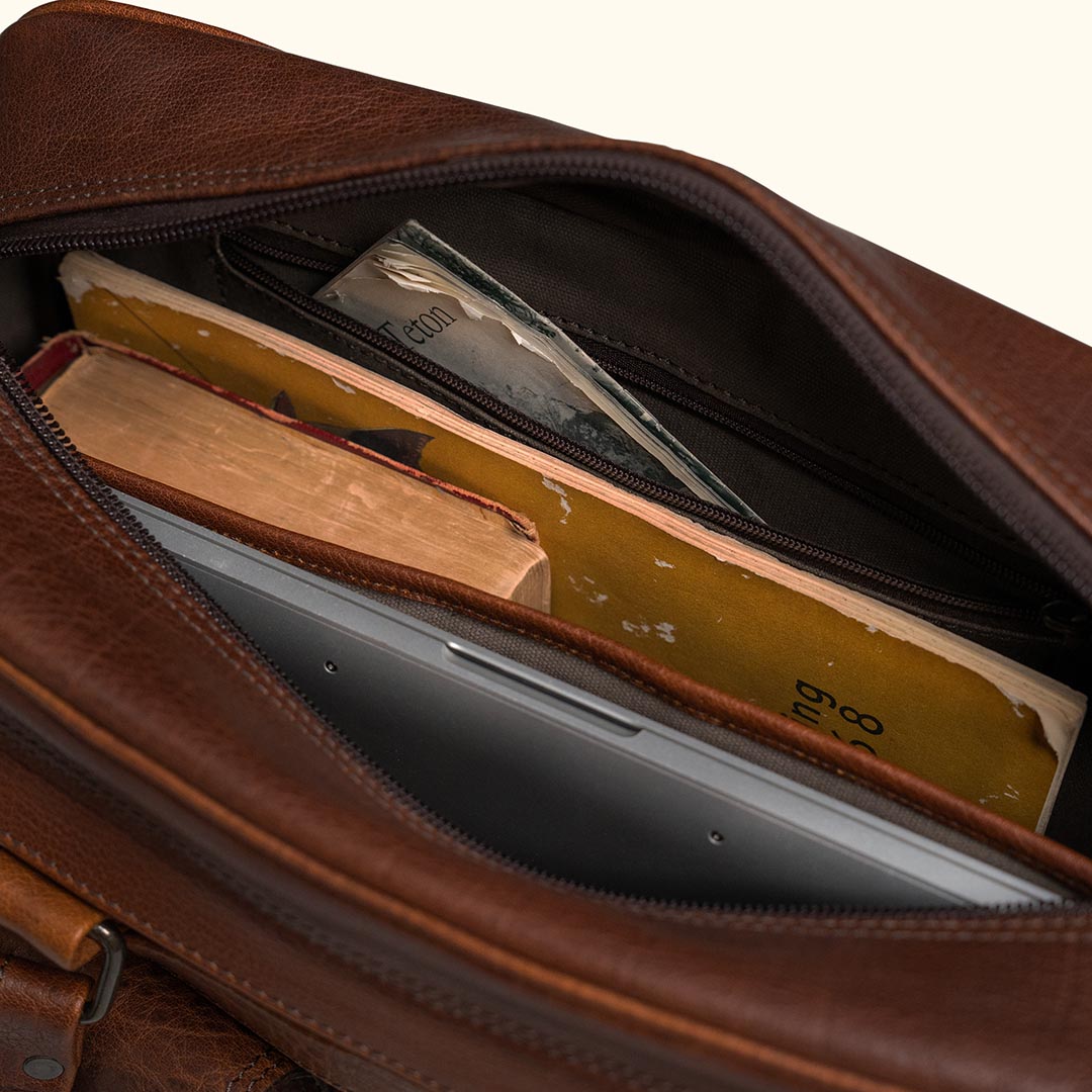 Interior - Separate Laptop Sleeve and areas for organization, zippered, and thick durable canvas