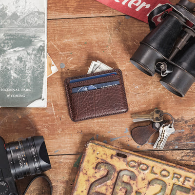 Slim full-grain buffalo leather wallet held in hand — minimalist everyday carry men's wallet from Buffalo Jackson