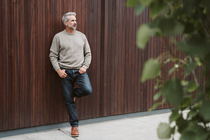 Man outdoors wearing the Buffalo Jackson Crewneck Wool Sweater in Wood Fleck