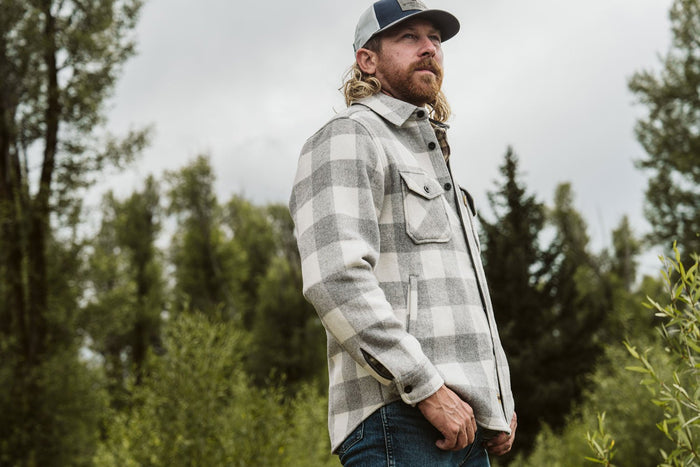 A man working outdoors in a Buffalo Jackson wool-blend shirt jac