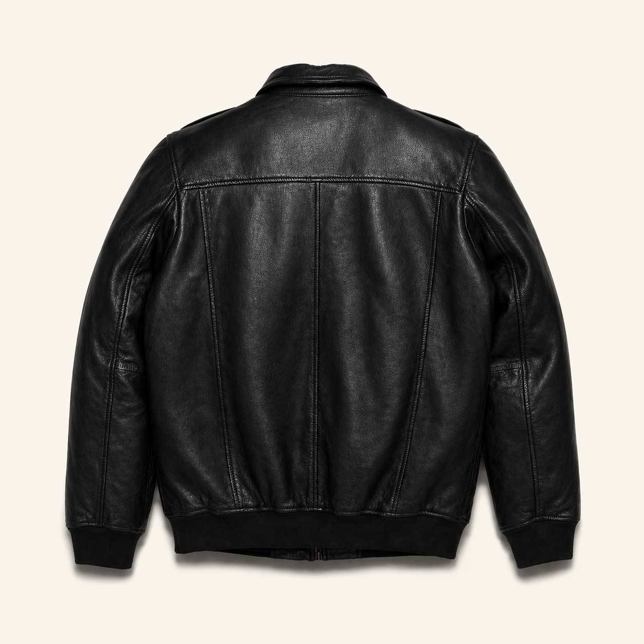 Back view of men's black lambskin bomber jacket with classic aviator silhouette and broken-in vintage finish