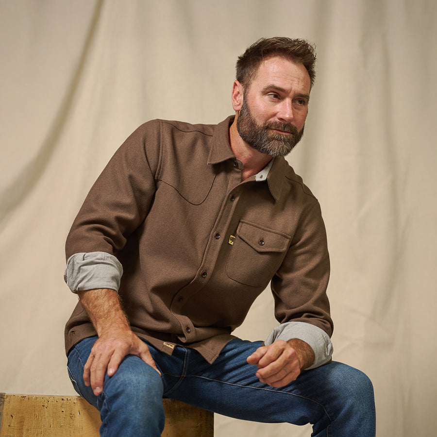 Fit display of Gunnison brown wool blend solid flannel shirt being worn – true to size drop-shoulder fit