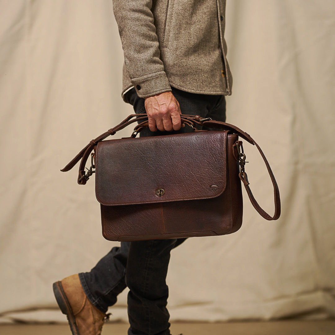 Roosevelt Leather Laptop Messenger Bag in Buffalo Grain — full-grain water buffalo leather with antique brass turn-lock clasp and adjustable shoulder strap