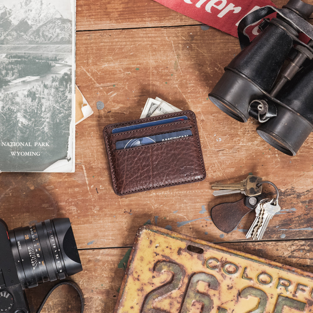 Slim full-grain buffalo leather wallet held in hand — minimalist everyday carry men's wallet from Buffalo Jackson