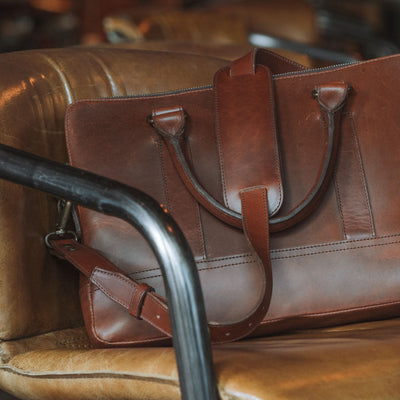 Polished leather attache bag, ideal for professional use.