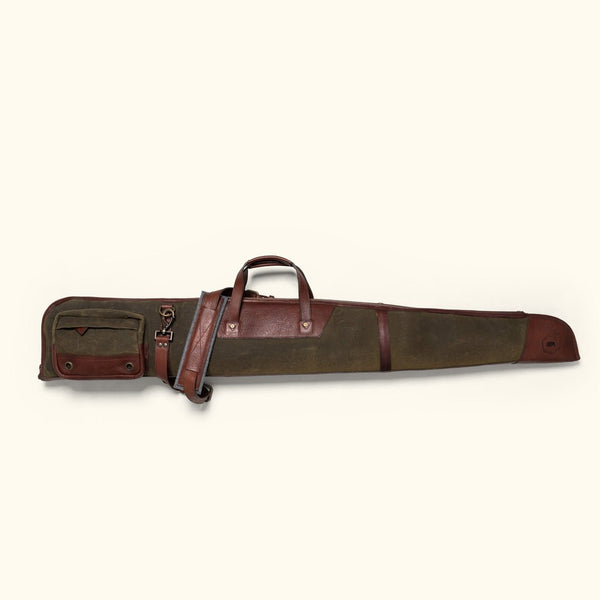 Dakota shotgun case in green 18 ounce waxed canvas with dark briar leather trim